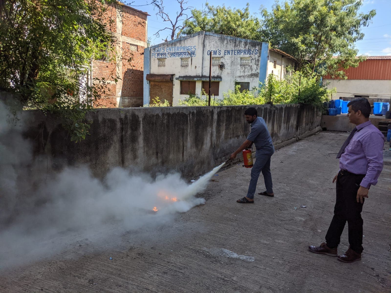Fire extinguisher demonstration during safety training